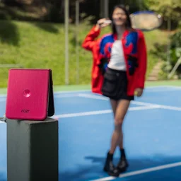 Motorola Razr 60 Ultra folded on a tennis court